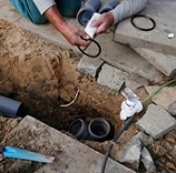 Professional working on pipes